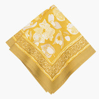 5: A pair of mustard/gold napkins with fruit print.