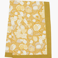 3: A gold, grey and white fruit print tea towel.