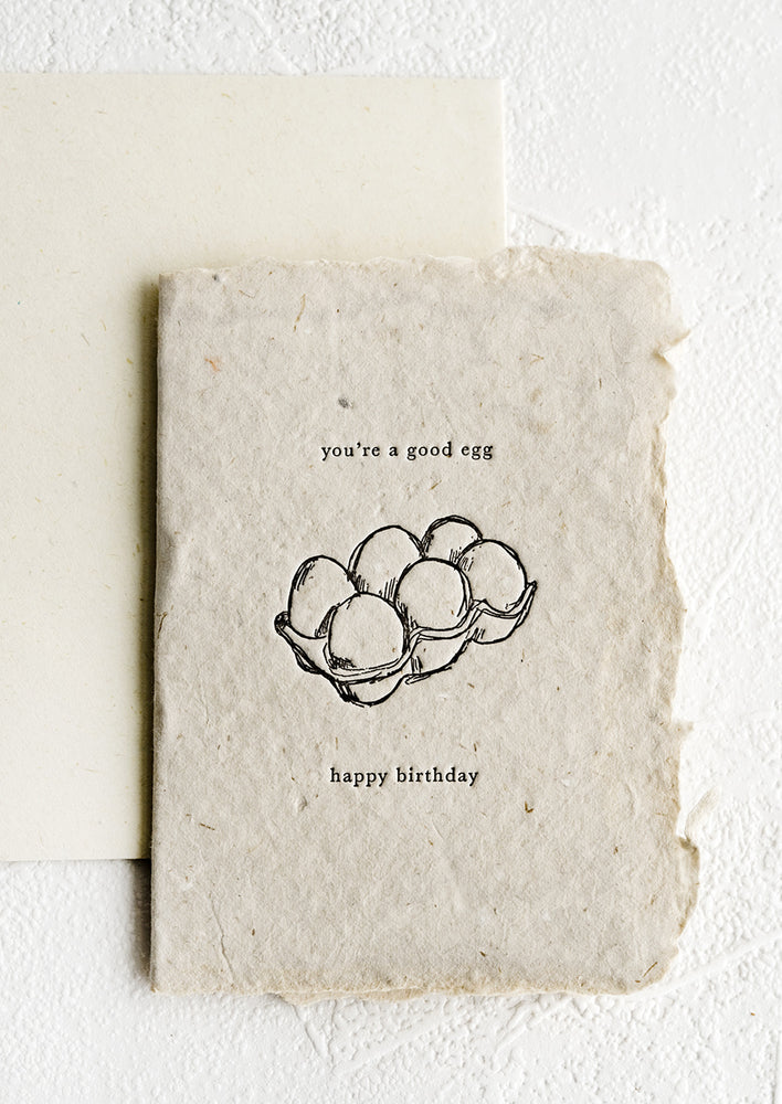 A birthday card made from handmade paper with image of an egg carton.