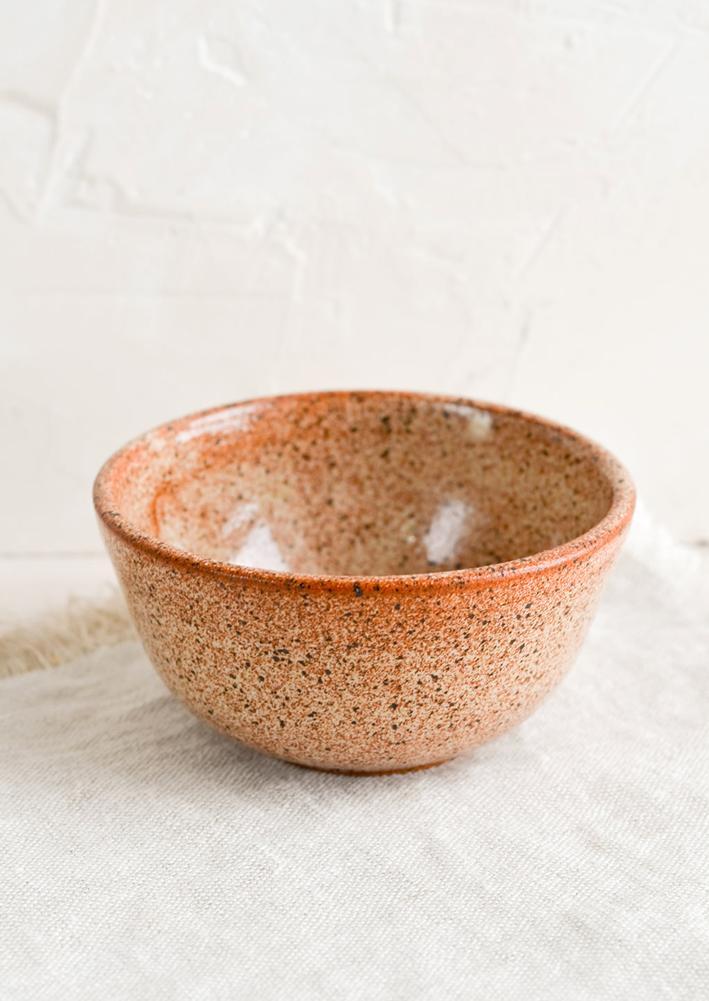 Rust Speckle: A small ceramic bowl in speckled rust.