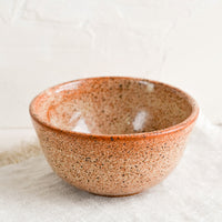 Rust Speckle: A small ceramic bowl in speckled rust.