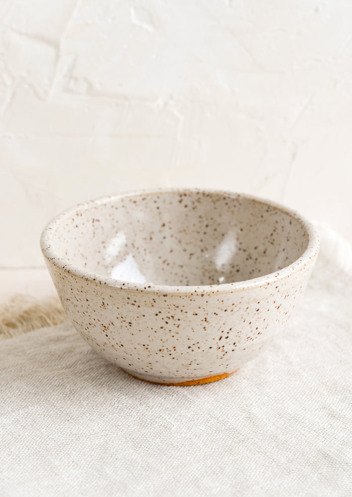White Speckle: A small ceramic bowl in speckled white.