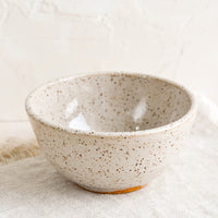 White Speckle: A small ceramic bowl in speckled white.