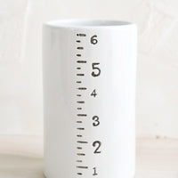 Small: Six inch ceramic vase with ruler detailing on side.