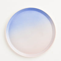 Dusk: A rimmed porcelain blue and pink ombre plate.