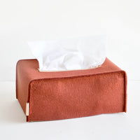 Oblong / Redwood: Rectangular-shaped tissue box cover made from felted wool in brick red color with leather accents