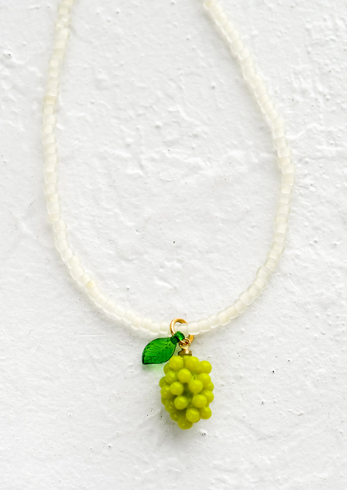 Green Grape: A beaded necklace with green grape bunch charm.