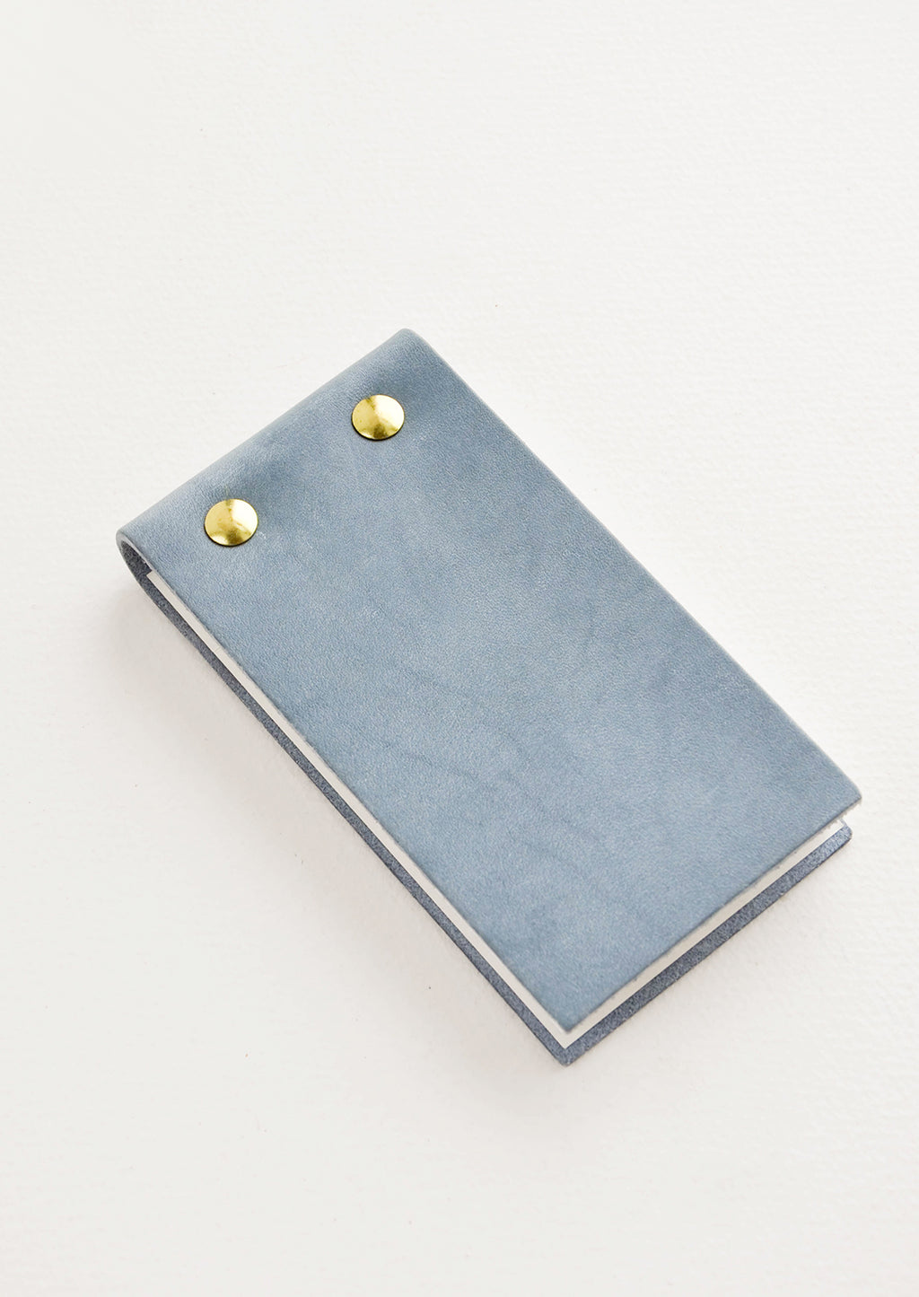Dusty Blue: Small blue leather notepad with brass grommets.
