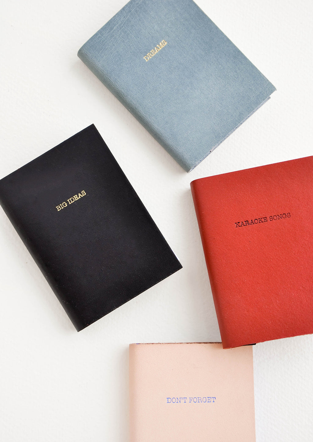 2: Product shot featuring multiple styles of mini notebook.