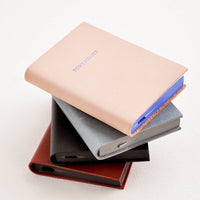 3: Stack of mini notebooks.