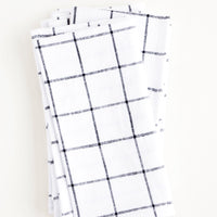 1: Pair of cloth cotton napkins in white with charcoal grid print