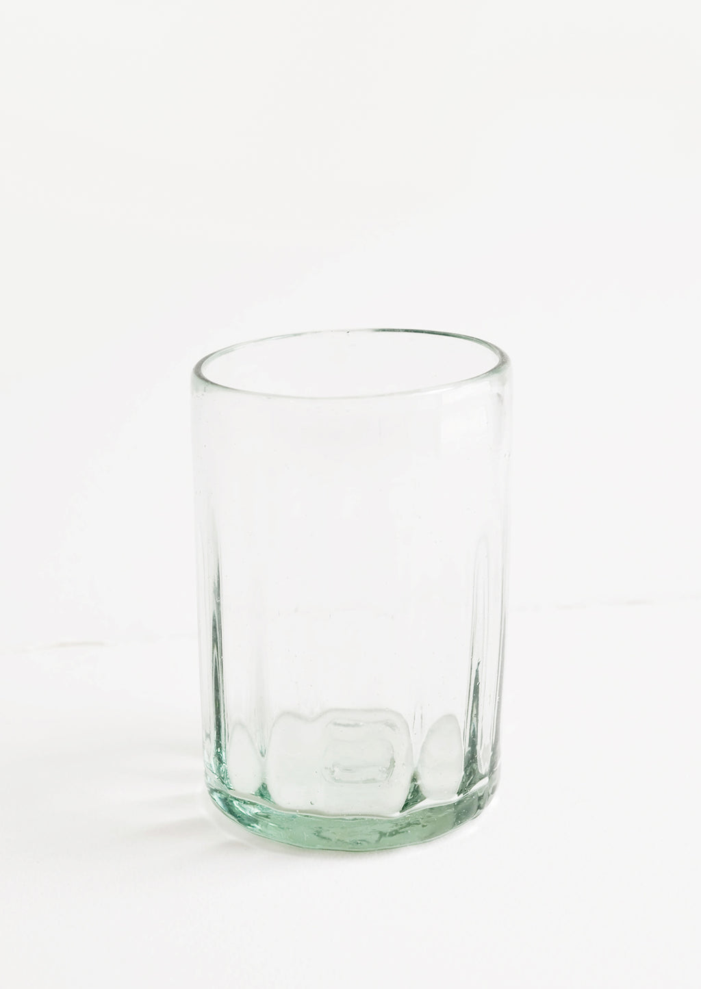 Wide [$16.00]: A horizontally ribbed tumblers in thick green hued glass.