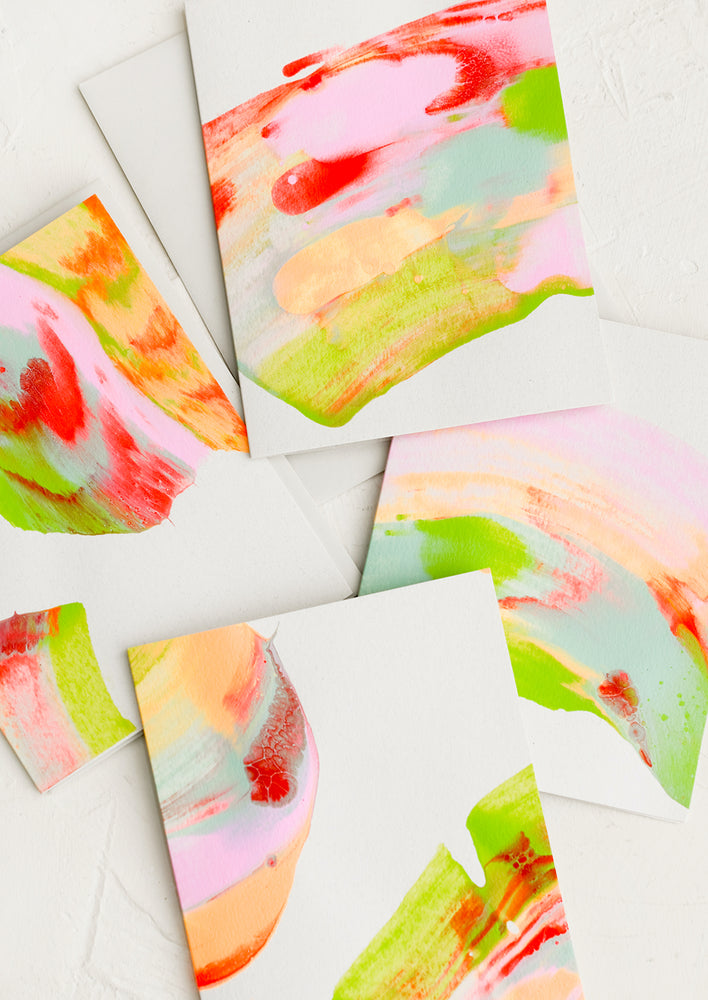 A set of greeting cards with multicolor paintstroke design.