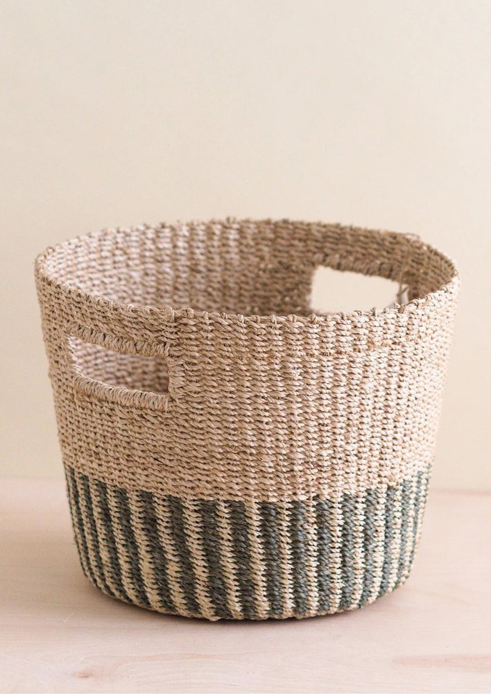 1: A tapered round basket with half stripe detail at bottom.