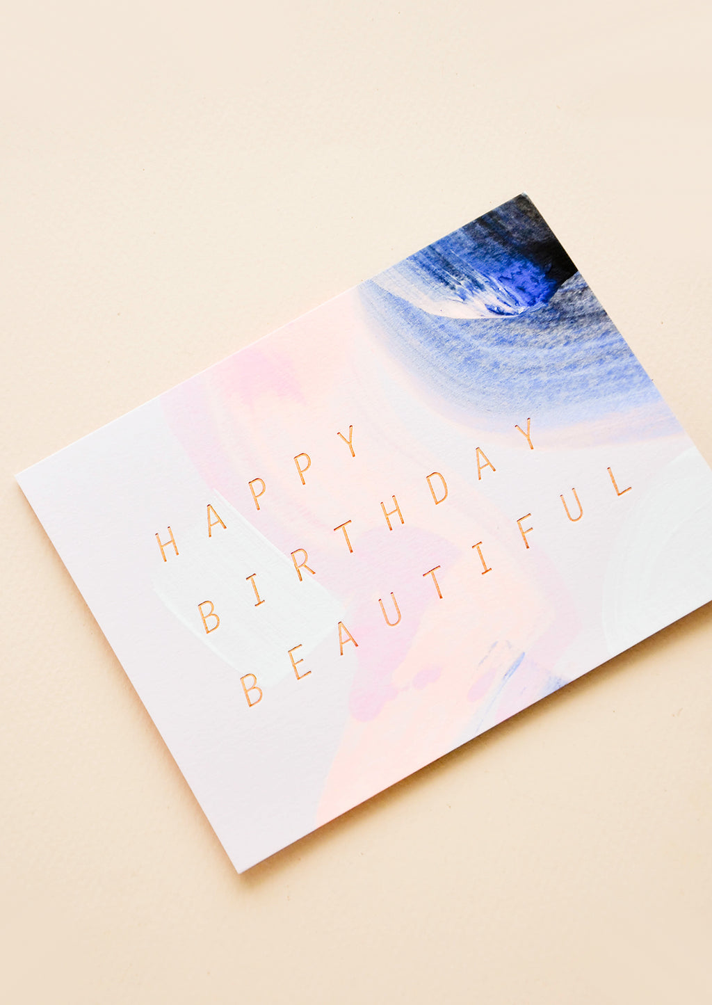 1: Greeting card with blue and pink brushstrokes and "Happy Birthday Beautiful" in copper foil.
