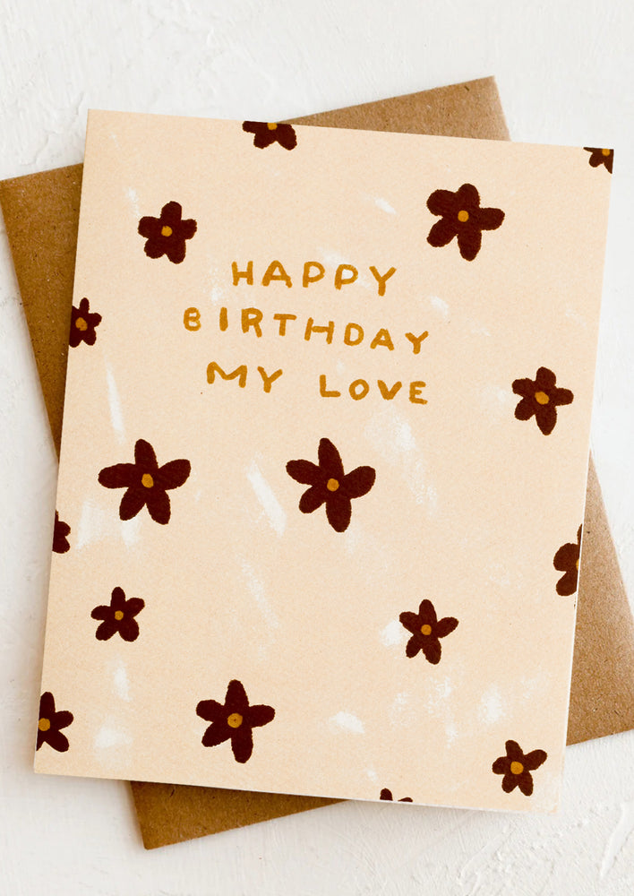 A flower print card reading "Happy birthday my love".