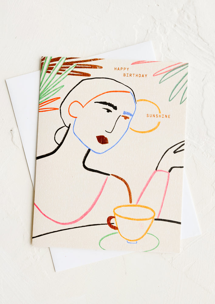 1: A greeting card with silhouette of woman drinking coffee, text reads "Happy birthday sunshine".