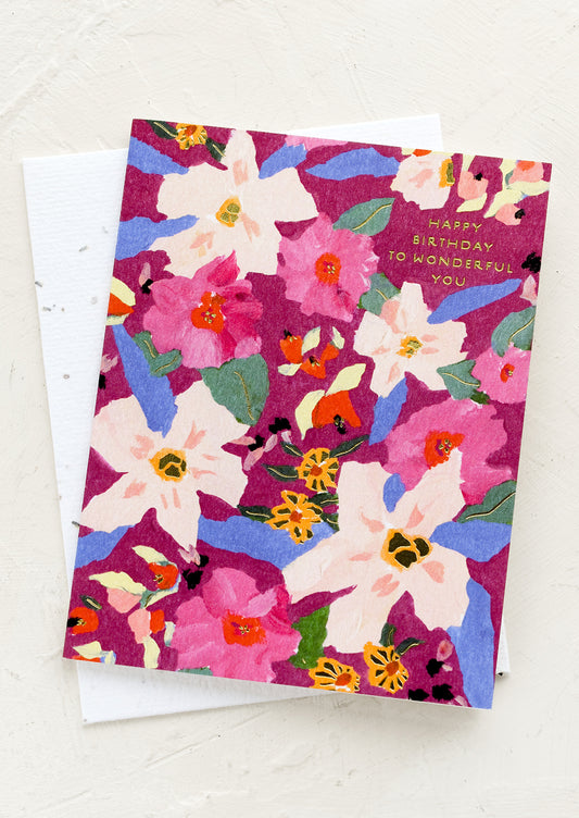 A floral print card reading "happy birthday to wonderful you".