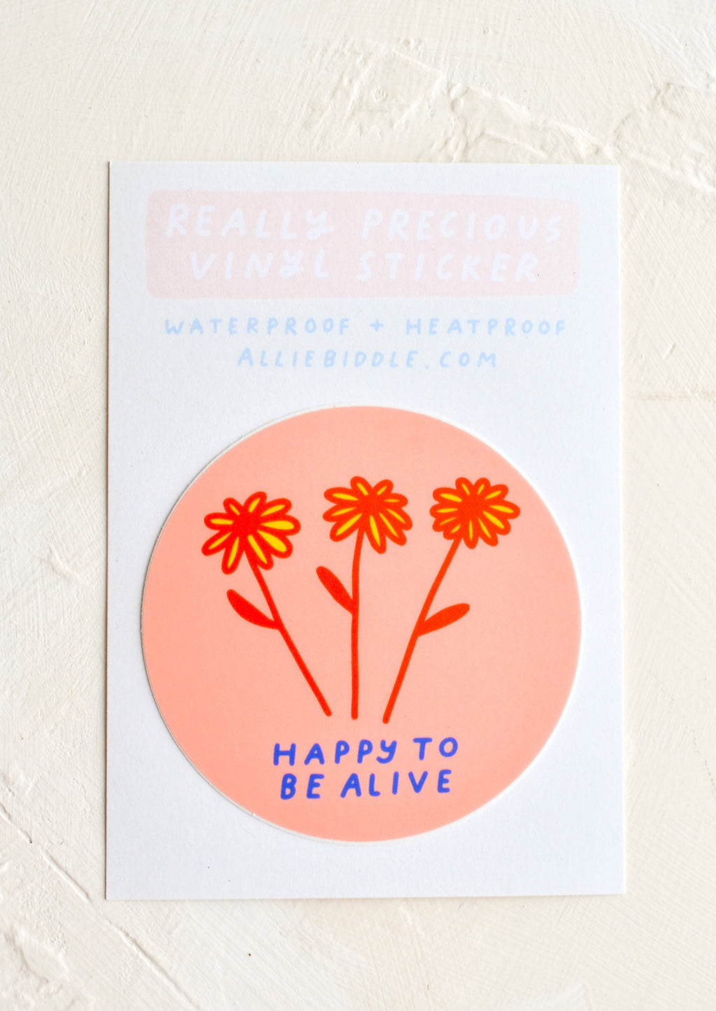 Happy to Be Alive: A circular vinyl sticker reading "happy to be alive" below a floral illustration.