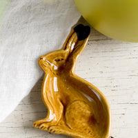 Hare Brown: A rabbit shaped ceramic trinket dish in brown.