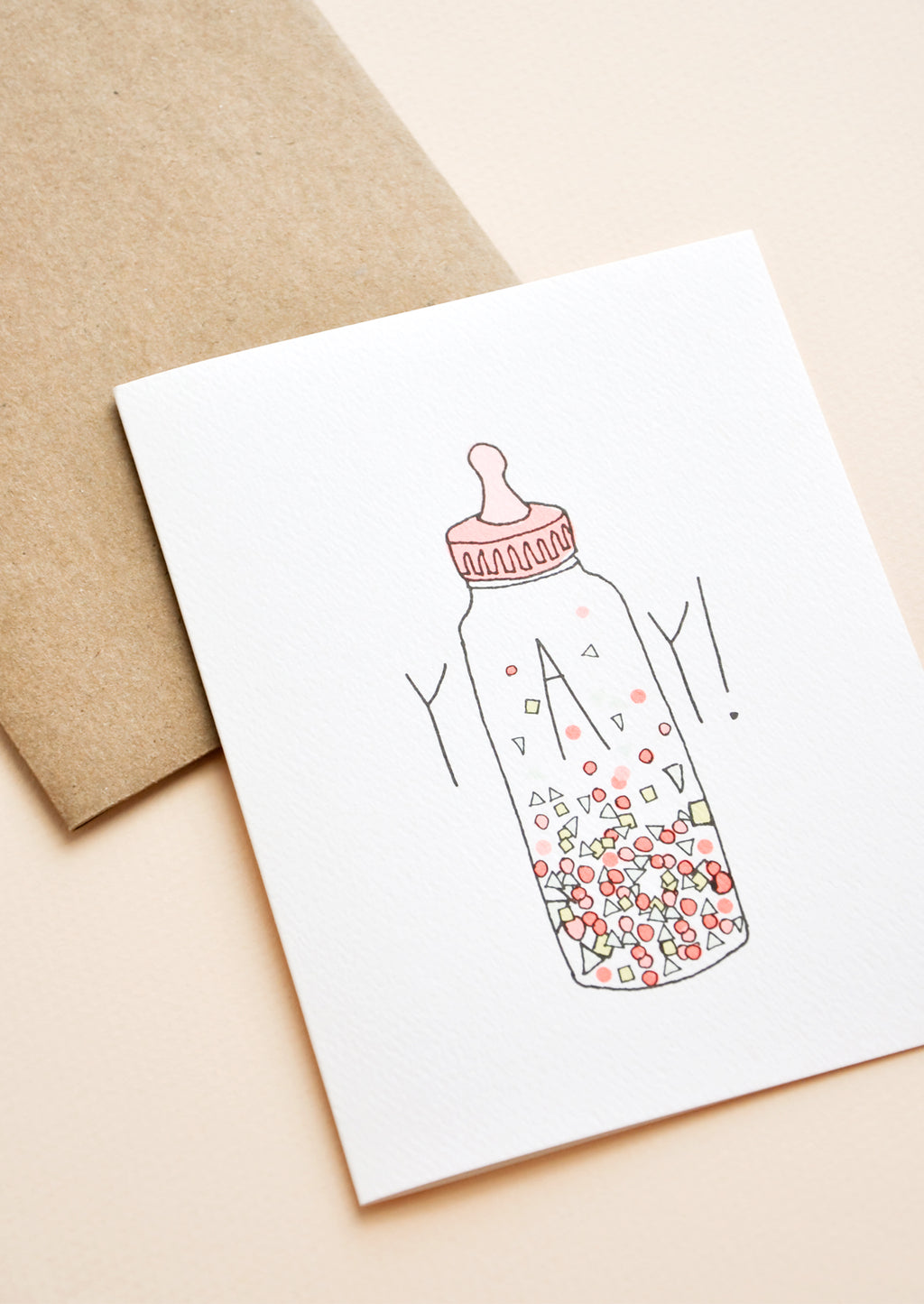 2: Greeting card with baby bottle filled with confetti and "YAY!" text