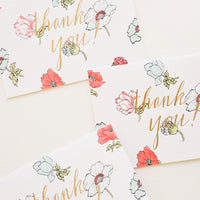 1: Set of notecards with neon flowers and the text "Thank you!" in gold foil.