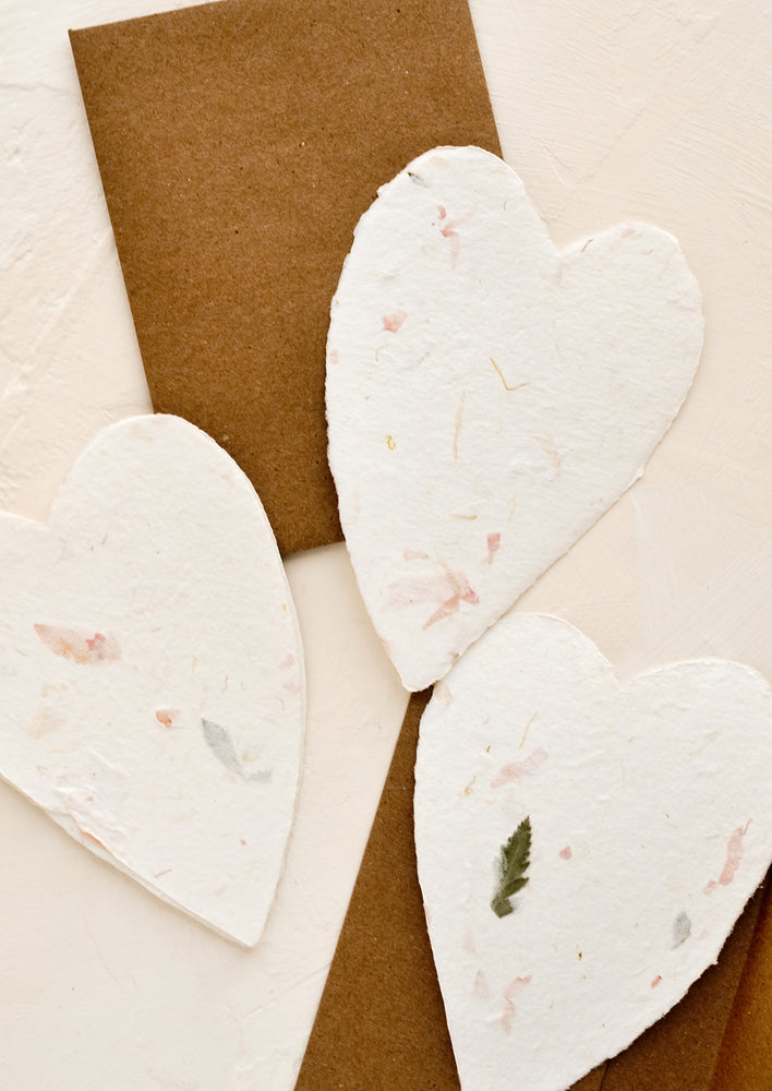 1: Heart shaped cards made from handmade flower paper.