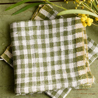Olive Green: A pair of olive green gingham cocktail napkins.