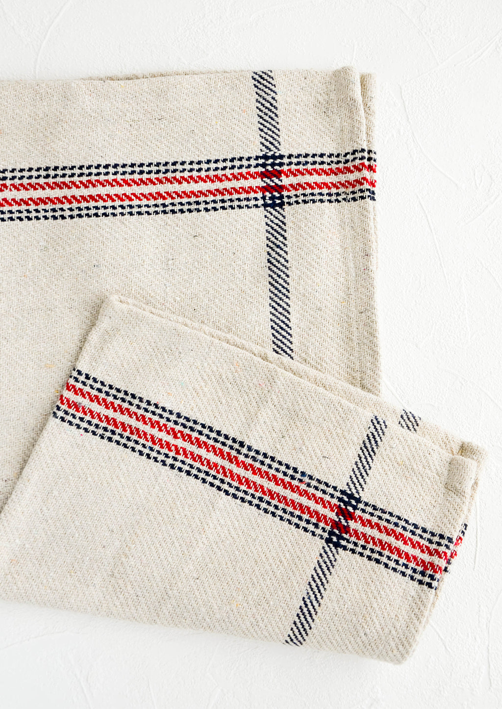 Natural / Red / Navy: Thick woven cotton kitchen towel in natural with blue and navy plaid stripe