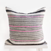 2: Square throw pillow in natural hemp fabric with varied stripes in black and hot pink