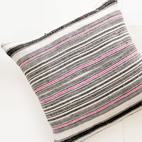 1: Square throw pillow in natural hemp fabric with varied stripes in black and hot pink