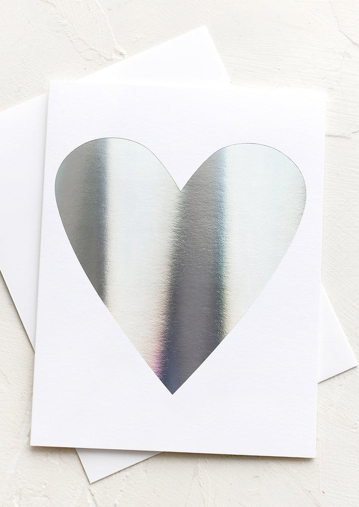 1: White card with silver holographic heart.