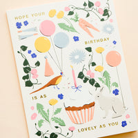 1: Whimsically illustrated greeting card with garden-centric scene and golden lettering reading "Hope your birthday is as lovely as you"