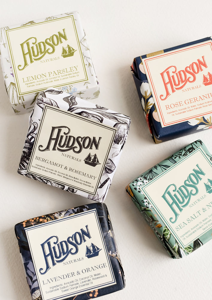 Wrapped bars of soap in assorted prints and scents.