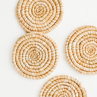 Tan: Set of 4 Round Woven Raffia Coasters in Tan and natural stripe.