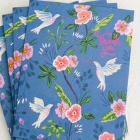 2: A set of blue greeting cards with hummingbird floral print, pink script at corner reads "Thank you".