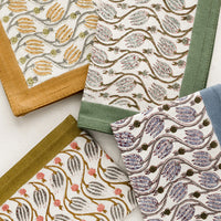 2: Floral print napkins in assortment of colors.