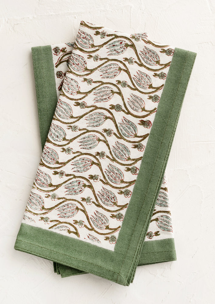 Floral print napkins with ivy green border.