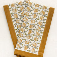 Spice Multi: Floral print napkins with spice border.