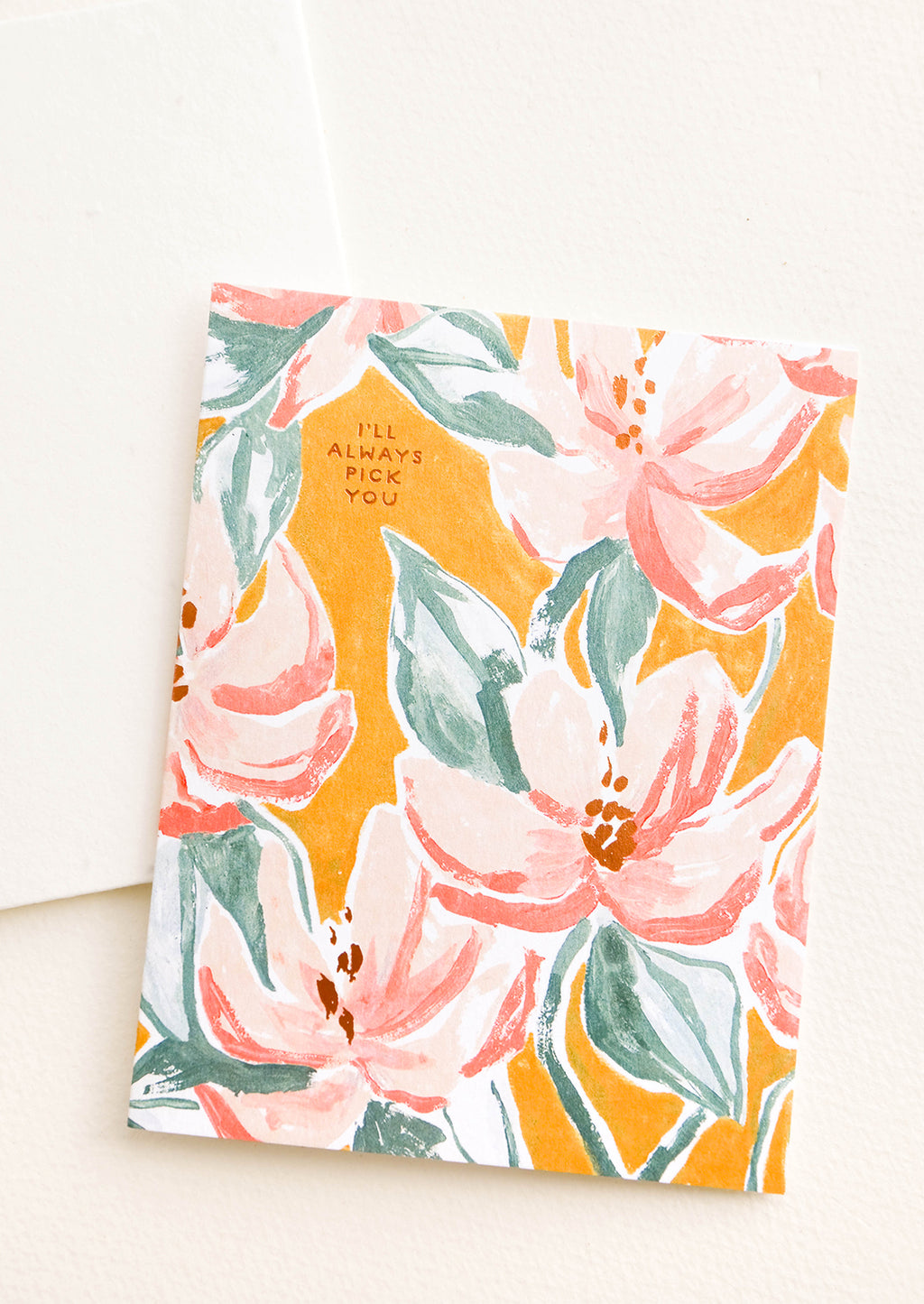 1: Greeting card with painterly floral pattern and copper text "I'll Always Pick You", paired with seed paper envelope