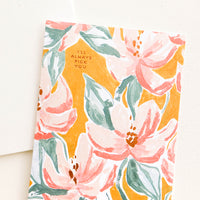 1: Greeting card with painterly floral pattern and copper text "I'll Always Pick You", paired with seed paper envelope