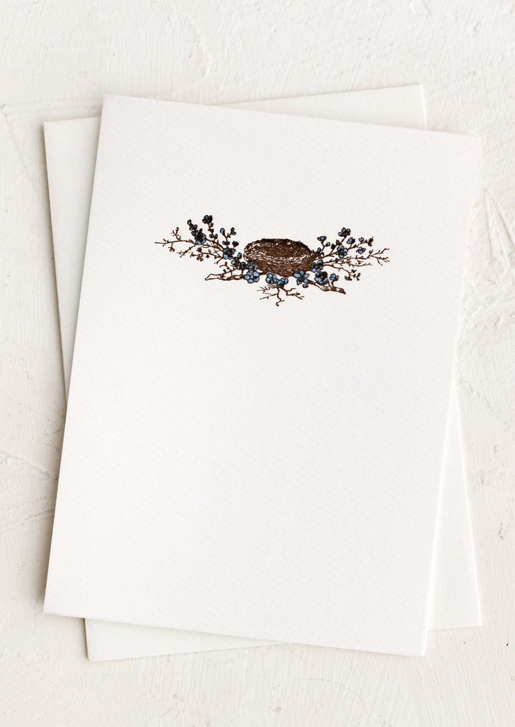 Birds Nest: A plain white card with small bird's nest design at front.