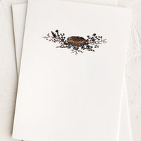 Birds Nest: A plain white card with small bird's nest design at front.