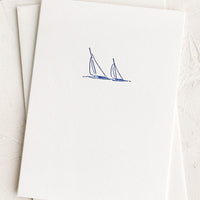 Sailboats: A plain white card with small sailboats icon at front.