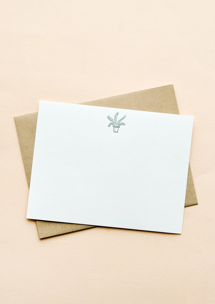 Potted Plant: A kraft envelope with white notecard and small icon of a potted plant printed at top.