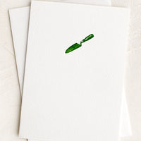 Garden Trowel: A plain white card with small green trowel at front.