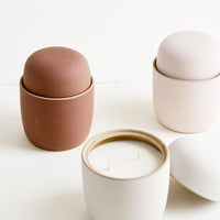 1: Scented candles in reusable matte ceramic vessel with lid