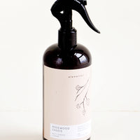 Rosewood Cassis: Amber plastic spray bottle with botanical label