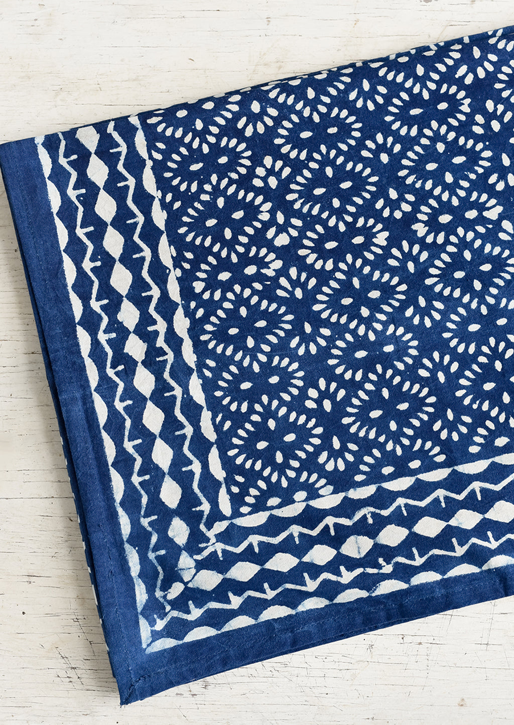 1: An indigo block printed tablecloth.