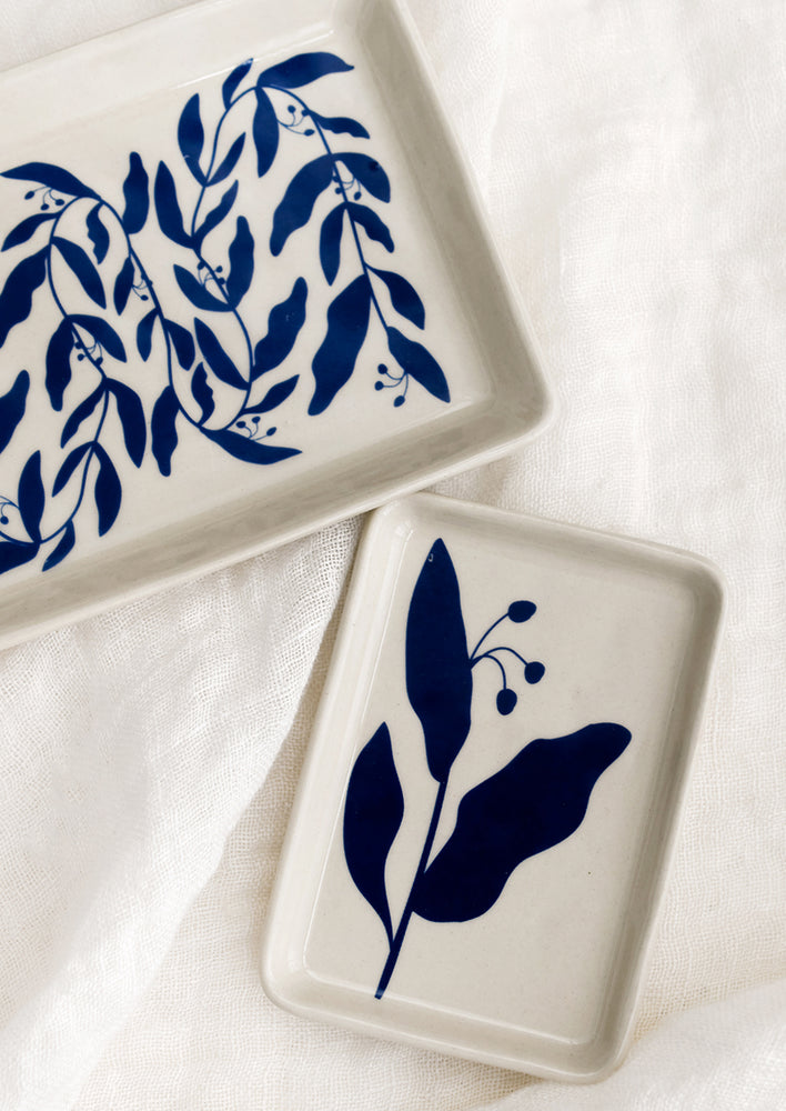 Blue botanical print trays in small and large.